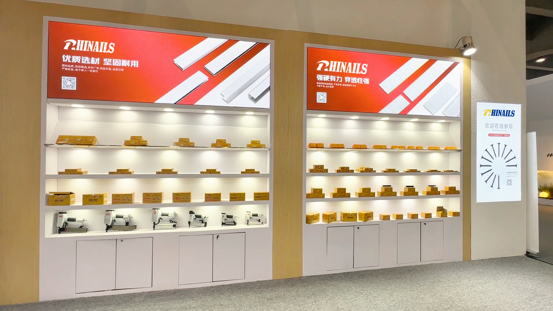 Rhinails Booth 6.7.8 at BDEXPO showcasing staples, nails, and screws